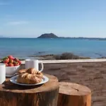 Beachfront San Antonio With Private Heated Pool Bbq In The Heart Of By Amazzzing Travel Villa Corralejo