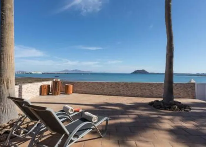 Beachfront San Antonio With Private Heated Pool Bbq In The Heart Of By Amazzzing Travel * Corralejo