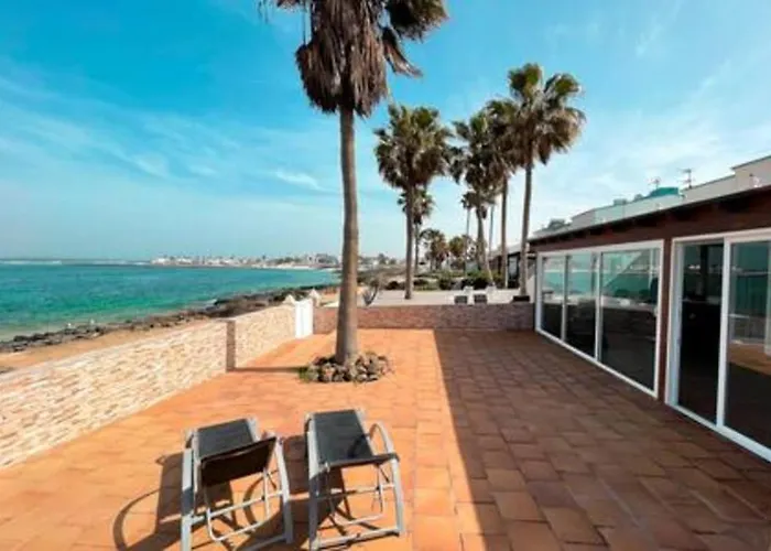 Beachfront San Antonio With Private Heated Pool Bbq In The Heart Of By Amazzzing Travel Corralejo